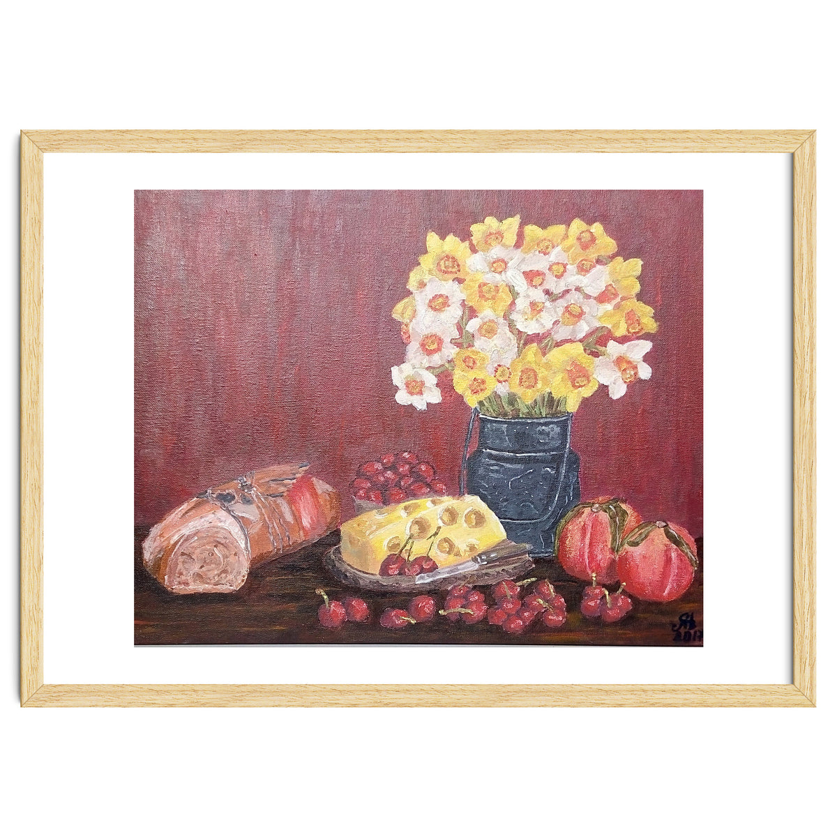 Still life with cheese, daffodils on a red background.