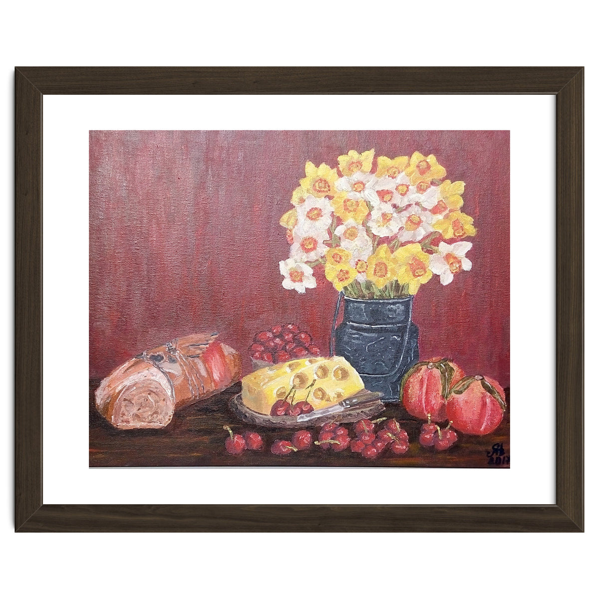 Still life with cheese, daffodils on a red background.