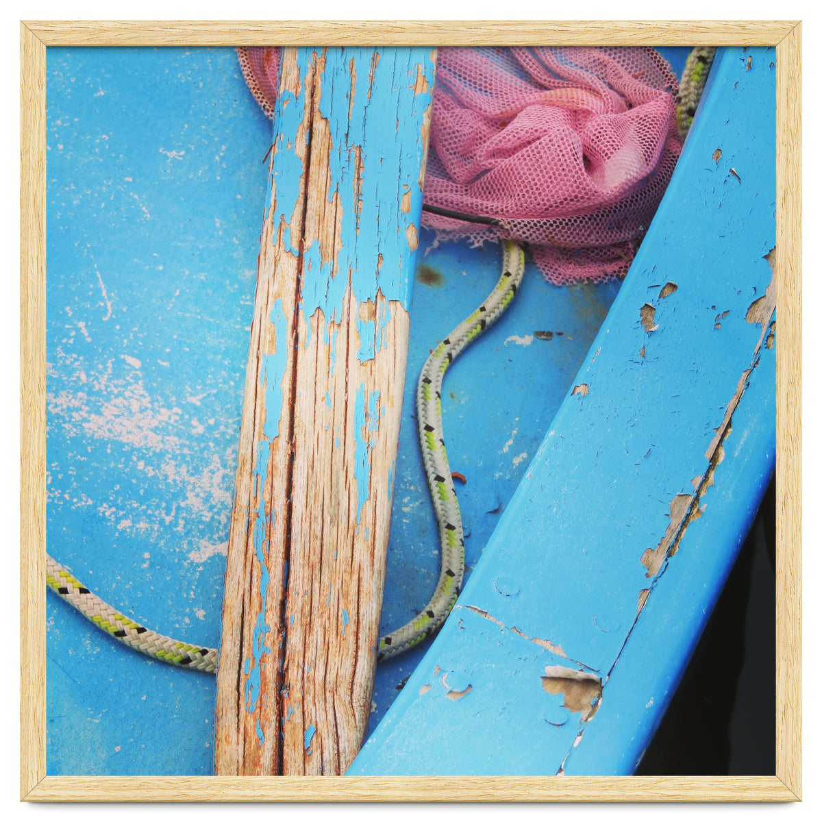 Weathered boat, sail and oar