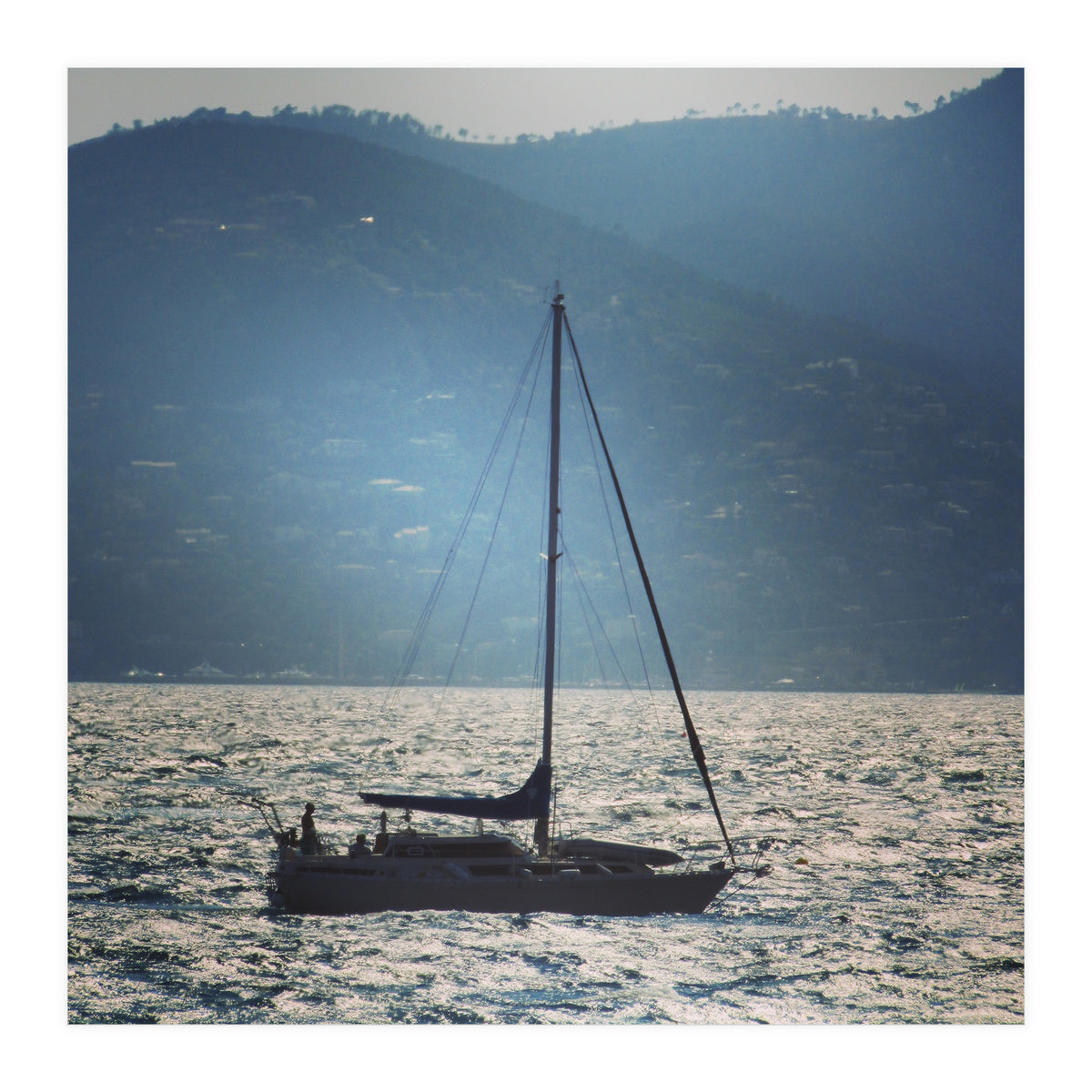 Sailing boat at sunset (Print Only)