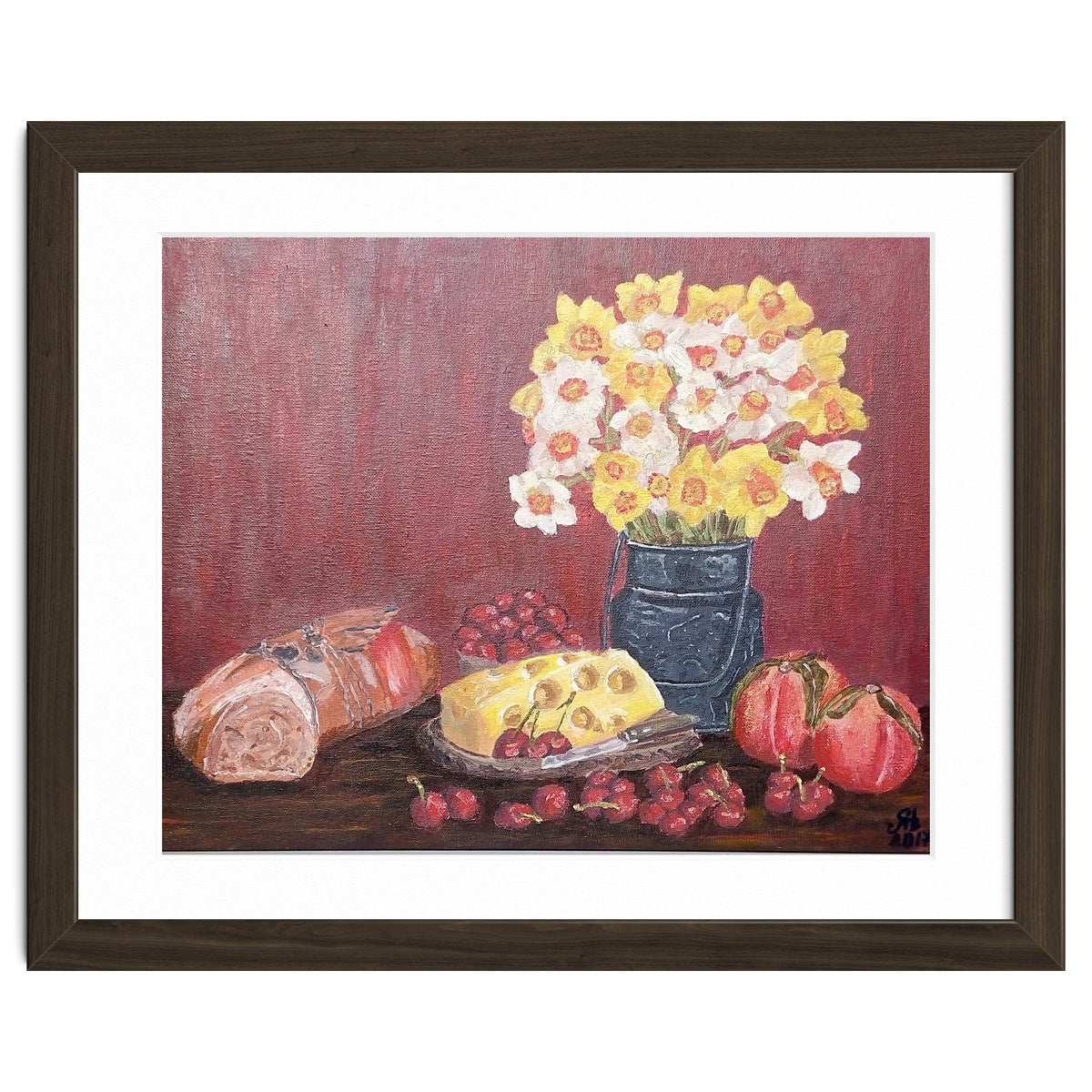 Still life with cheese, daffodils on a red background.