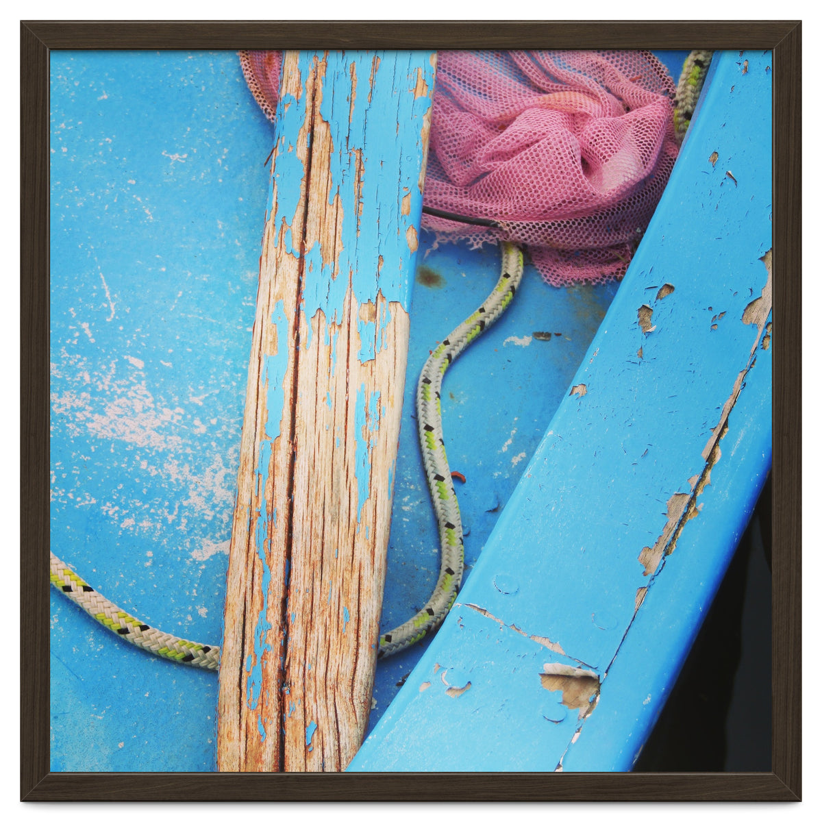 Weathered boat, sail and oar