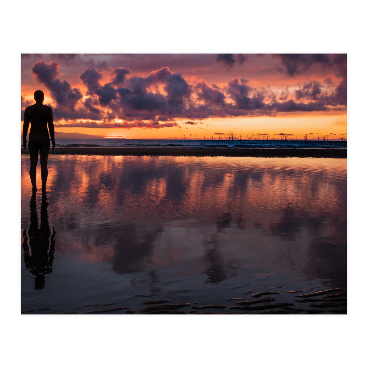 Sunset at Another Place - Sir Antony Gormley statues at Crosby Beach in Merseyside, England.  (Print Only)