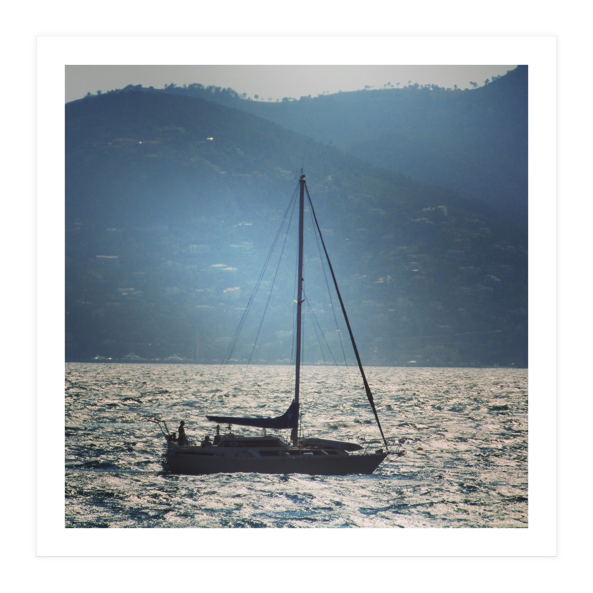 Sailing boat at sunset (Print Only)
