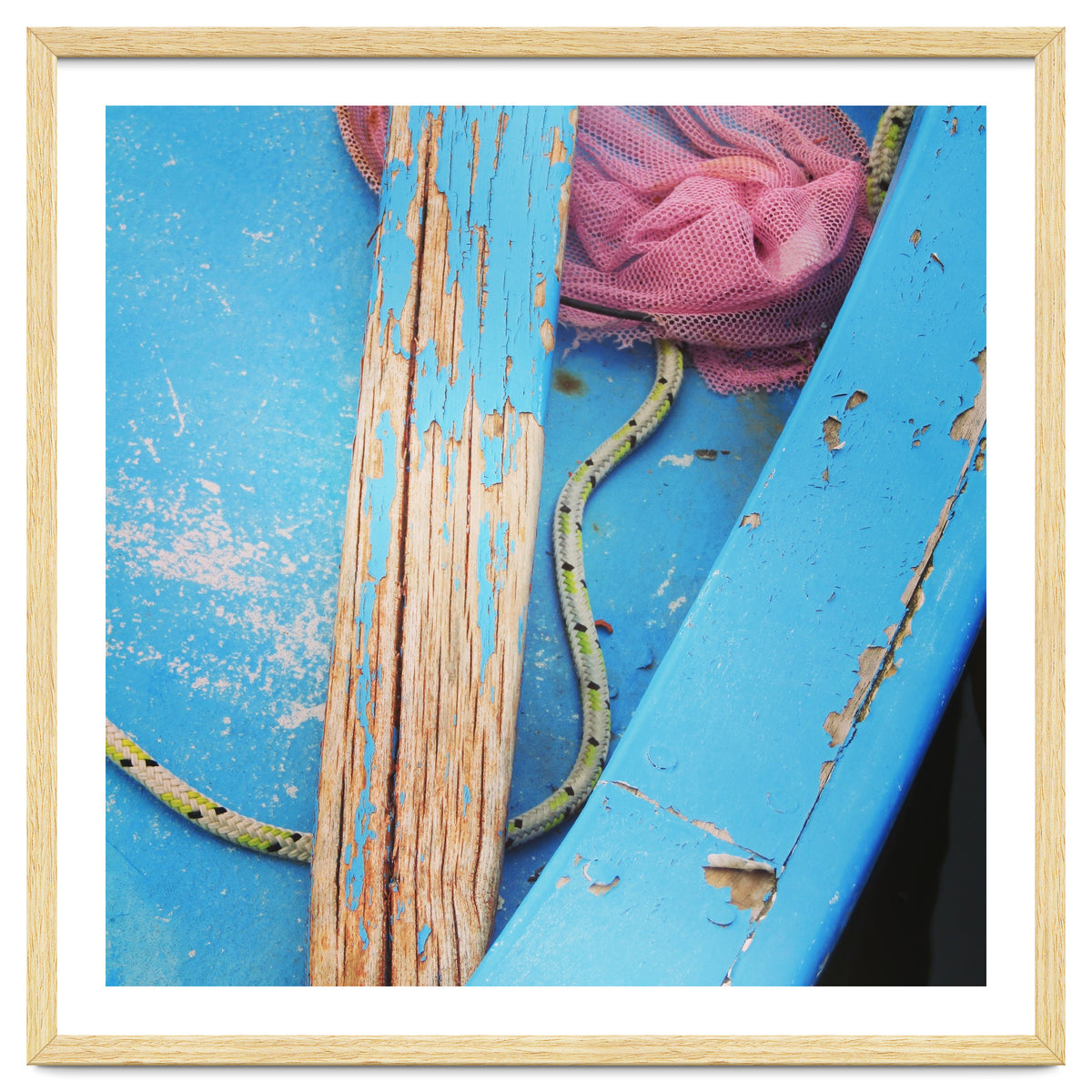 Weathered boat, sail and oar