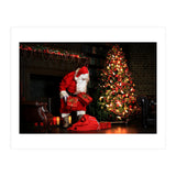Santa Claus put his Christmas gift under the Xmas tree at midnight (Print Only) thumbnail