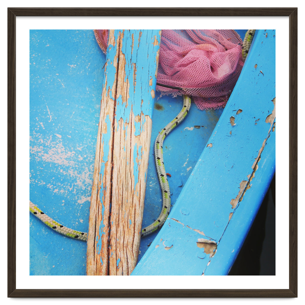 Weathered boat, sail and oar